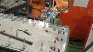 Laser welding of metal plate manipulator