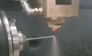 Water cooled laser cutting of mini metal round tube
